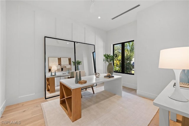 850 10th St N, Naples, FL 34102 - home office featuring light wood-style flooring and recessed lighting
