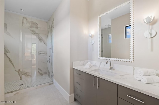 850 10th St N, Naples, FL 34102 - bathroom featuring a marble finish shower and vanity