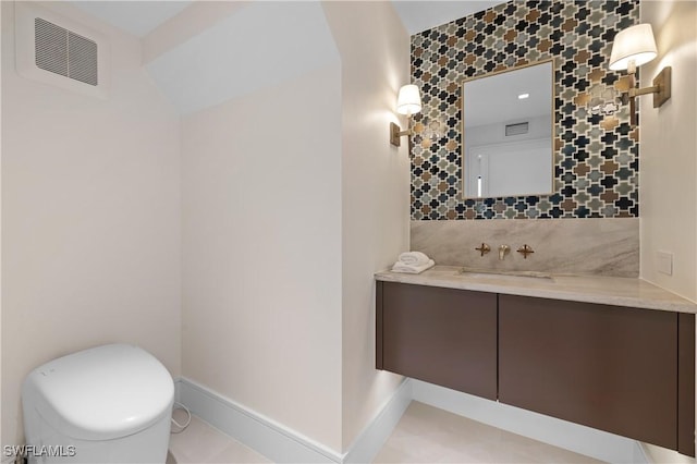850 10th St N, Naples, FL 34102 - bathroom with vanity and toilet