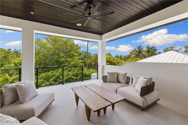 850 10th St N, Naples, FL 34102 - view of patio featuring an outdoor living space and a ceiling fan