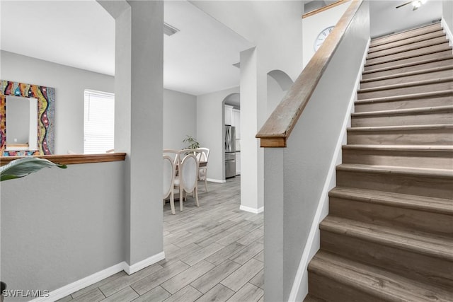 8094 Silver Birch Way, Lehigh Acres, FL 33971 - stairs with wood finish floors and arched walkways