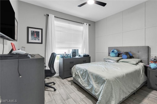 8094 Silver Birch Way, Lehigh Acres, FL 33971 - bedroom featuring light wood-type flooring, an office area, and ceiling fan