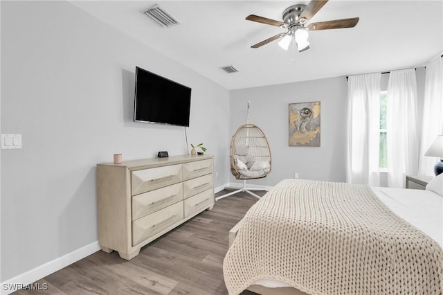 8094 Silver Birch Way, Lehigh Acres, FL 33971 - bedroom featuring wood finished floors and a ceiling fan