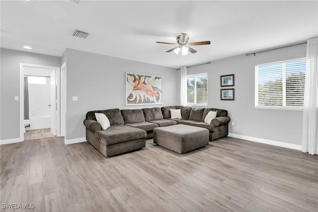 8094 Silver Birch Way, Lehigh Acres, FL 33971 - living area featuring a ceiling fan, wood finished floors, and recessed lighting