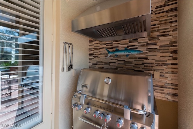 3681 Mossy Oak Dr, Fort Myers, FL 33905 - detailed view of exhaust hood, beverage cooler, and a textured wall