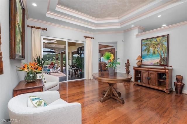 3681 Mossy Oak Dr, Fort Myers, FL 33905 - sitting room with wood finished floors, crown molding, a raised ceiling, and recessed lighting