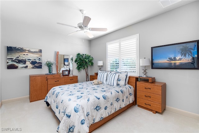 3681 Mossy Oak Dr, Fort Myers, FL 33905 - bedroom with light colored carpet and ceiling fan
