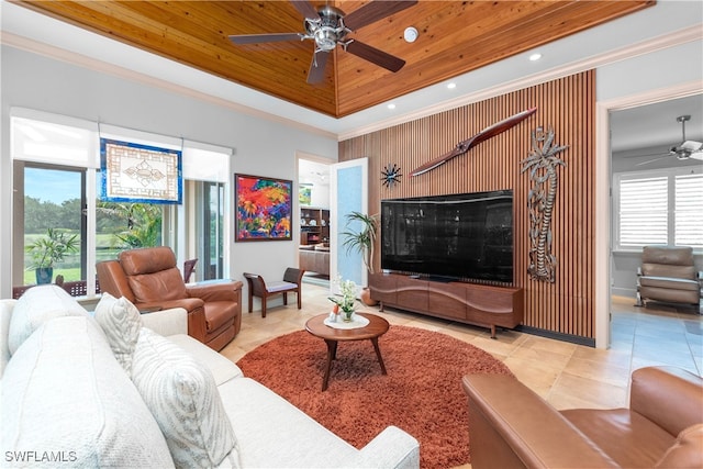 3681 Mossy Oak Dr, Fort Myers, FL 33905 - living room with a ceiling fan, a tray ceiling, plenty of natural light, light tile patterned floors, and recessed lighting