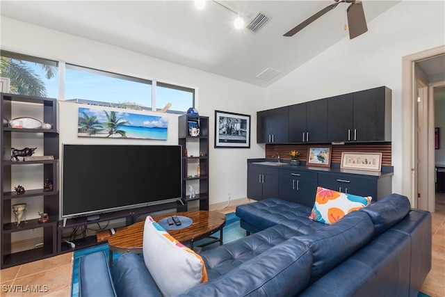 3681 Mossy Oak Dr, Fort Myers, FL 33905 - living area with a ceiling fan, rail lighting, and vaulted ceiling