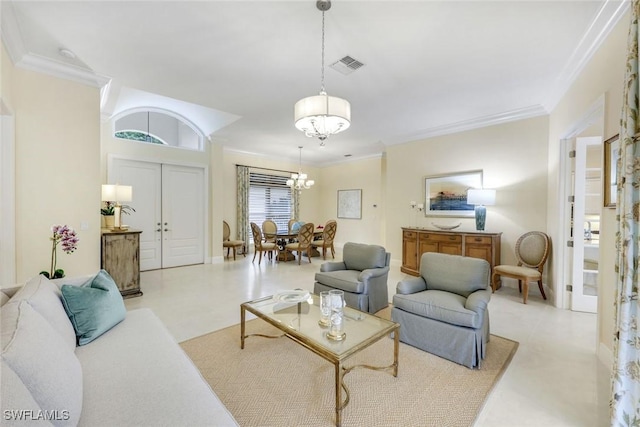 6632 Glen Arbor Way, Naples, FL 34119 - living room featuring ornamental molding and a chandelier