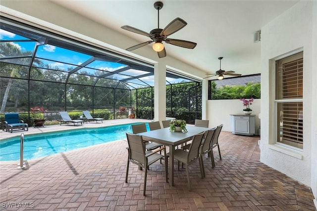 6632 Glen Arbor Way, Naples, FL 34119 - swimming pool with a patio, outdoor dining space, ceiling fan, and a lanai