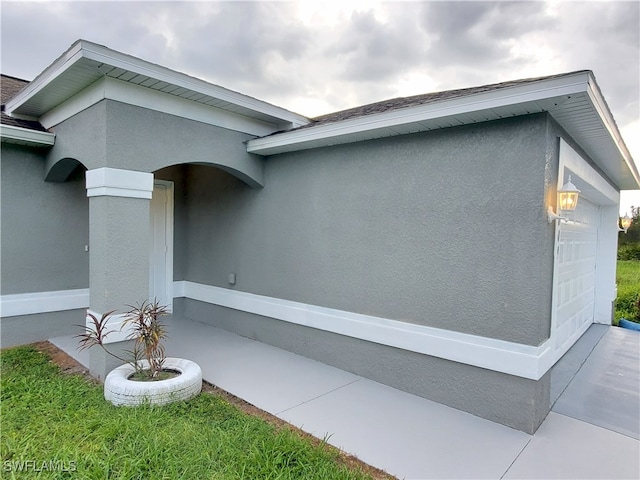 3009 44th St W, Lehigh Acres, FL 33971 - view of home's exterior featuring stucco siding