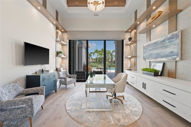 4297 Deephaven Ln, Naples, FL 34119 - office space with a tray ceiling, light wood-style flooring, recessed lighting, and a towering ceiling