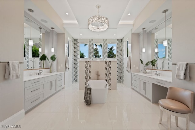 4297 Deephaven Ln, Naples, FL 34119 - bathroom with a chandelier, a freestanding tub, two vanities, recessed lighting, and a tray ceiling