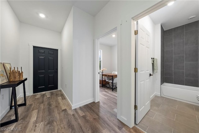 2429/2431 Lola Ave S, Lehigh Acres, FL 33973 - foyer entrance with wood finished floors and recessed lighting