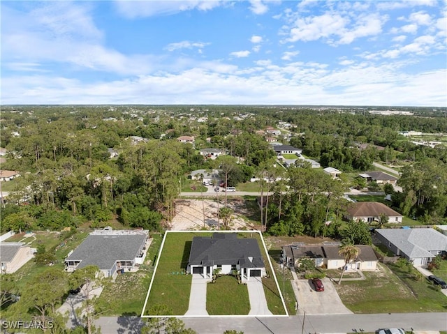 2429/2431 Lola Ave S, Lehigh Acres, FL 33973 - aerial view of property's location featuring property boundaries highlighted and nearby suburban area