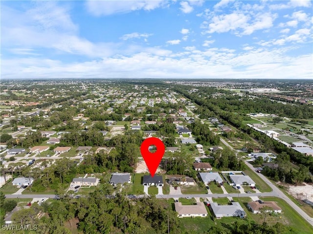 2429/2431 Lola Ave S, Lehigh Acres, FL 33973 - aerial view of property's location featuring nearby suburban area
