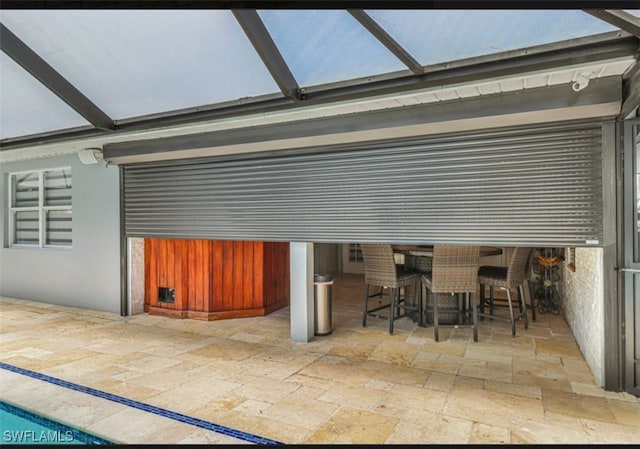 4442 18th Ave SW, Naples, FL 34116 - view of patio / terrace with glass enclosure