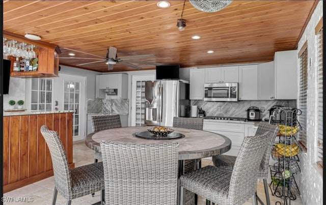 4442 18th Ave SW, Naples, FL 34116 - dining room with wooden ceiling, recessed lighting, a ceiling fan, and light tile patterned floors