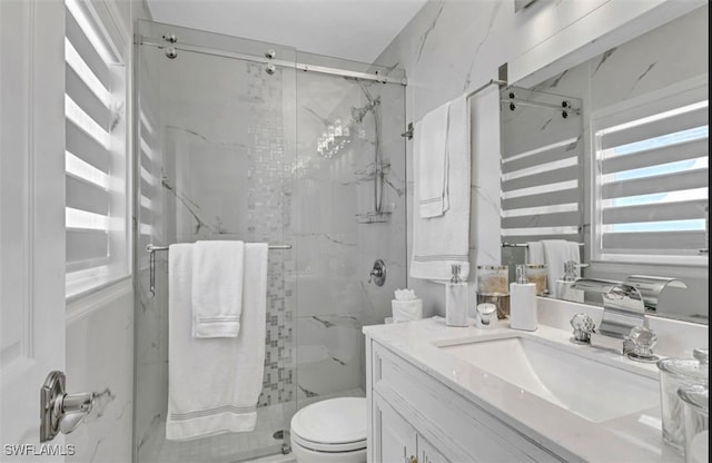 4442 18th Ave SW, Naples, FL 34116 - bathroom featuring a marble finish shower and vanity