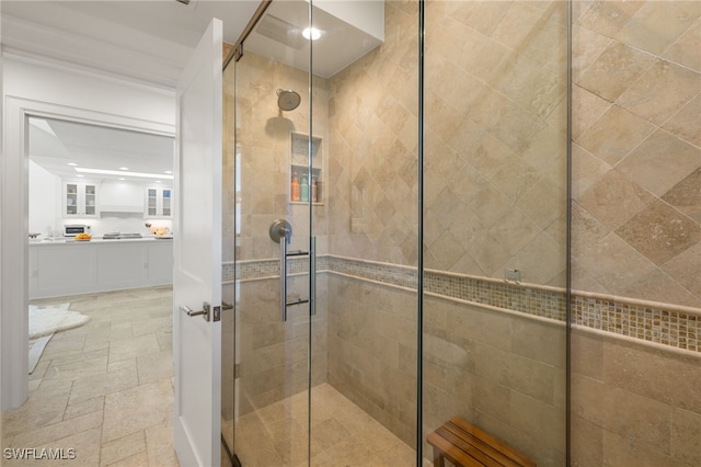 320 Putter Point Dr, Naples, FL 34103 - bathroom featuring a shower stall, stone tile floors, vanity, and recessed lighting