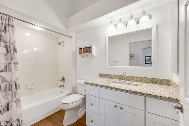 8621 Gleneagle Way, Naples, FL 34120 - full bathroom featuring vanity, shower / bath combo with shower curtain, and wood finished floors