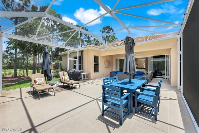 8621 Gleneagle Way, Naples, FL 34120 - view of patio / terrace with an outdoor living space, outdoor dining area, and a lanai
