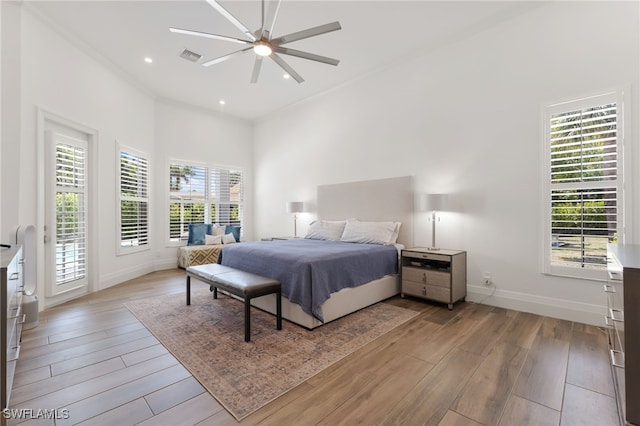 2274 Hawksridge Dr, Naples, FL 34105 - bedroom featuring light wood-style flooring, access to exterior, recessed lighting, and a ceiling fan