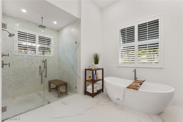 2274 Hawksridge Dr, Naples, FL 34105 - bathroom with marble finish flooring, a marble finish shower, a freestanding tub, and recessed lighting