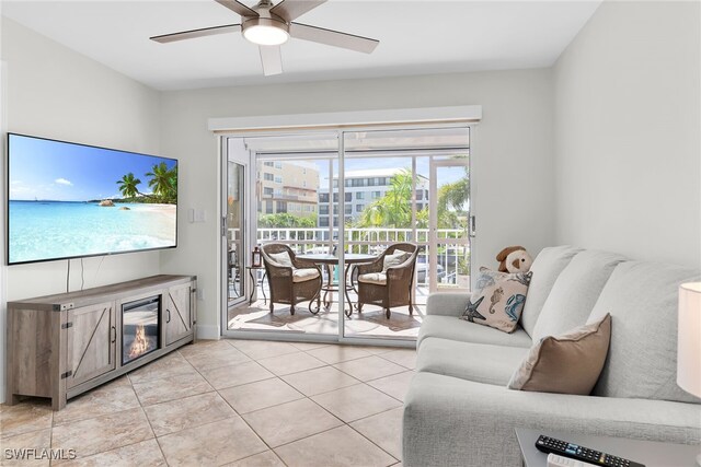 919 Huron Ct Unit B203, Marco Island, FL 34145 - living room featuring a ceiling fan and light tile patterned floors