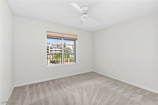 919 Huron Ct Unit B203, Marco Island, FL 34145 - carpeted spare room with baseboards and ceiling fan