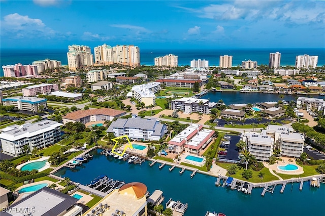 919 Huron Ct Unit B203, Marco Island, FL 34145 - view of urban area with a nearby body of water and a pool area