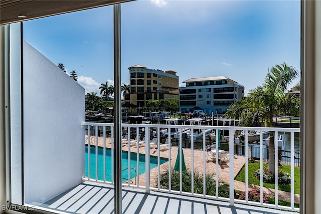 919 Huron Ct Unit B203, Marco Island, FL 34145 - balcony featuring view of pool