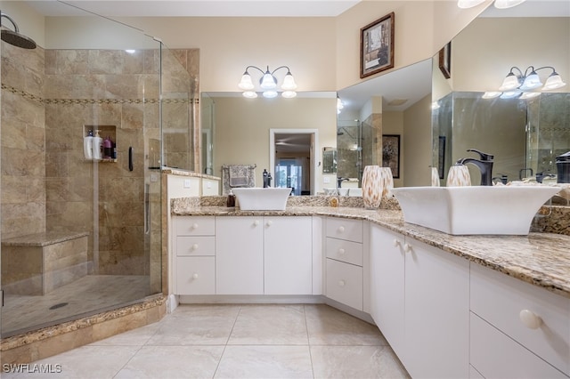 15050 Lakeside View Dr Unit 1001, Fort Myers, FL 33919 - full bathroom featuring a stall shower and double vanity