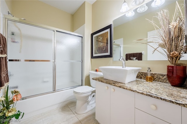 15050 Lakeside View Dr Unit 1001, Fort Myers, FL 33919 - full bath featuring vanity, shower / bath combination with glass door, and tile patterned floors