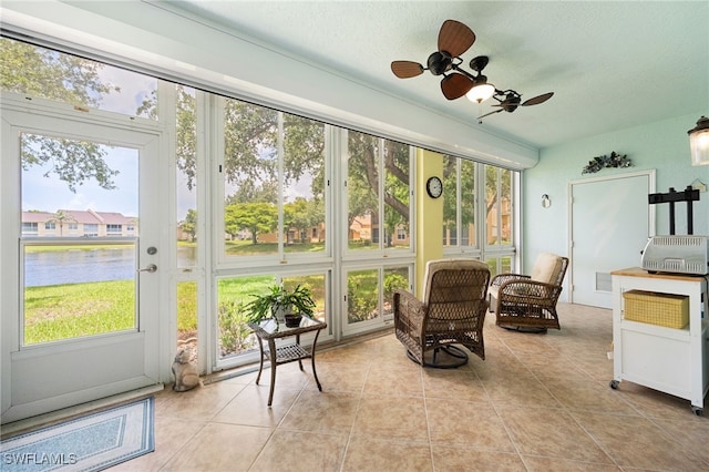 15050 Lakeside View Dr Unit 1001, Fort Myers, FL 33919 - sunroom featuring healthy amount of natural light, a water view, and a ceiling fan