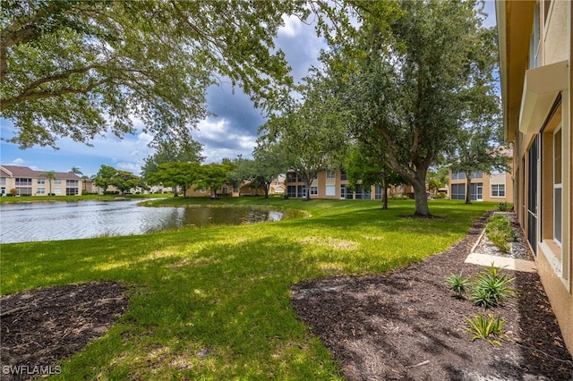 15050 Lakeside View Dr Unit 1001, Fort Myers, FL 33919 - view of grassy yard with a water view