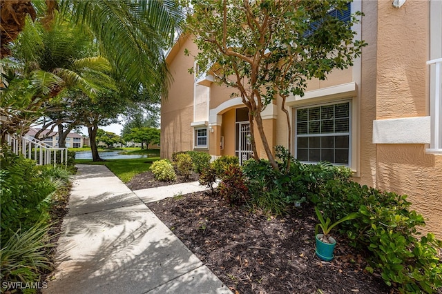 15050 Lakeside View Dr Unit 1001, Fort Myers, FL 33919 - property entrance with stucco siding