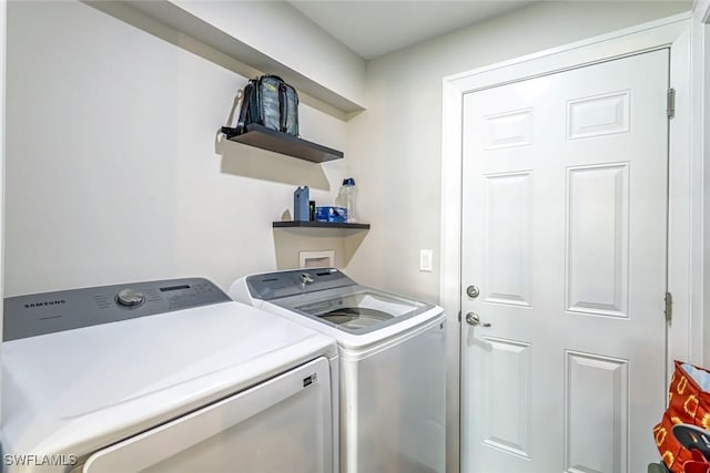 2806 22nd St W, Lehigh Acres, FL 33971 - washroom featuring independent washer and dryer
