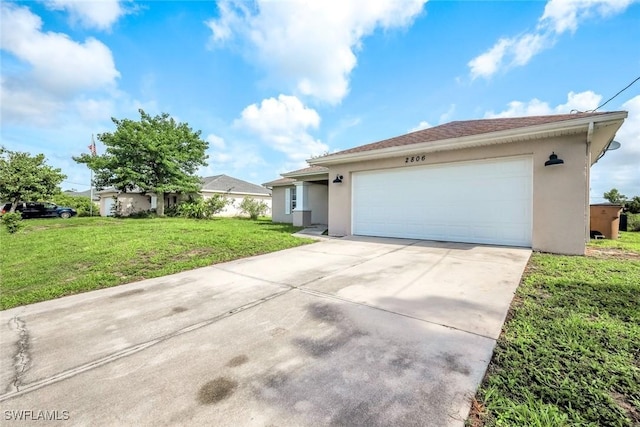 2806 22nd St W, Lehigh Acres, FL 33971 - ranch-style home featuring stucco siding, a front yard, driveway, and a garage