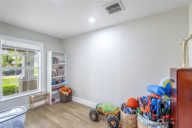 2806 22nd St W, Lehigh Acres, FL 33971 - rec room featuring light wood finished floors and recessed lighting