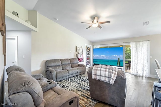 2806 22nd St W, Lehigh Acres, FL 33971 - living area featuring ceiling fan, vaulted ceiling, and wood finished floors