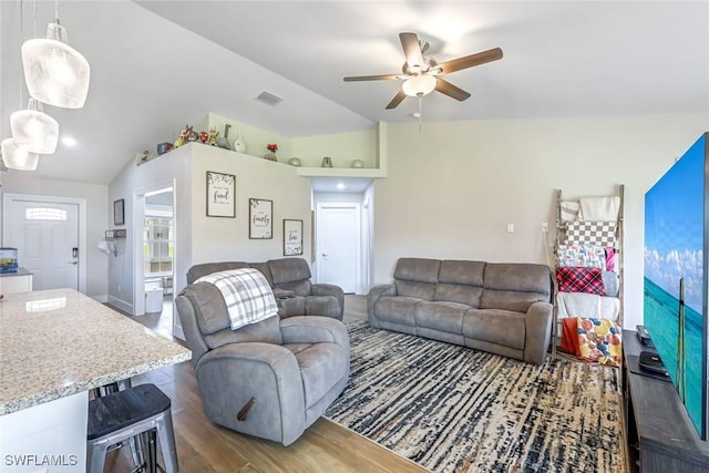 2806 22nd St W, Lehigh Acres, FL 33971 - living room with lofted ceiling, wood finished floors, and ceiling fan