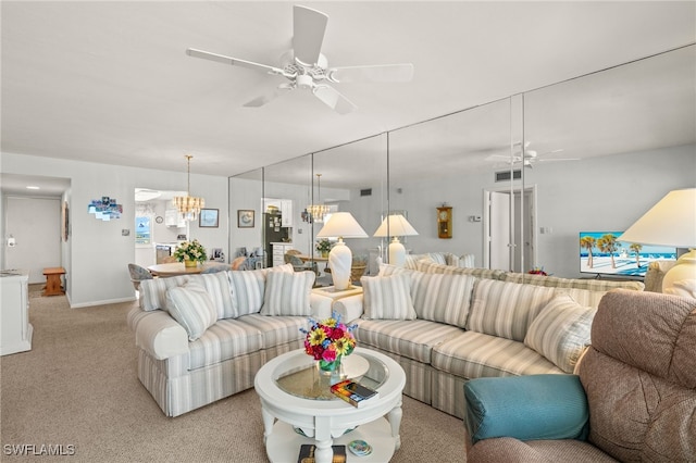 7400 Estero Blvd Unit 629, Fort Myers Beach, FL 33931 - living room with a ceiling fan, light colored carpet, and a chandelier