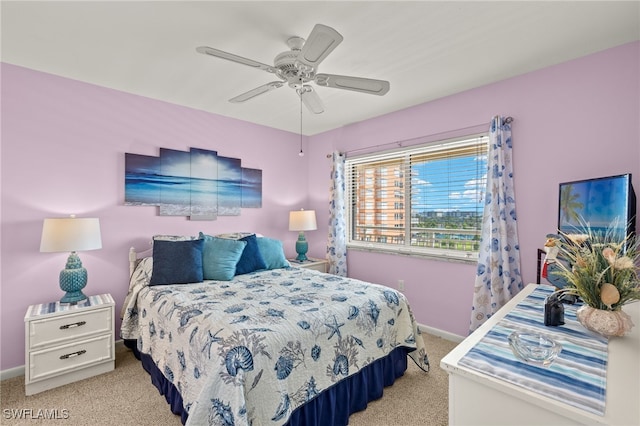 7400 Estero Blvd Unit 629, Fort Myers Beach, FL 33931 - bedroom with light carpet and ceiling fan