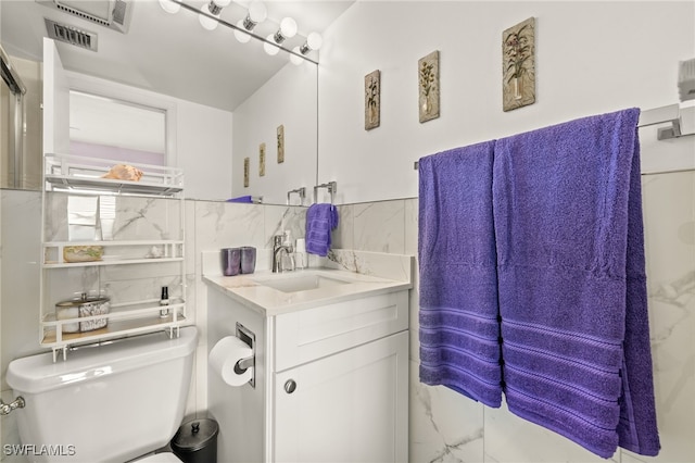 7400 Estero Blvd Unit 629, Fort Myers Beach, FL 33931 - bathroom featuring vanity and marble look tile flooring