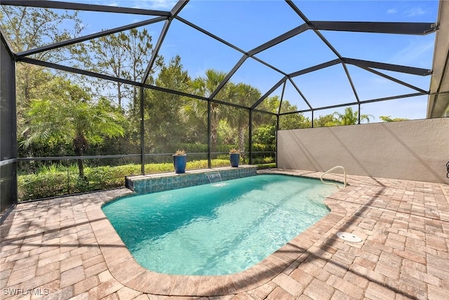 7690 Jacaranda Ln, Naples, FL 34114 - swimming pool featuring a patio area and a lanai