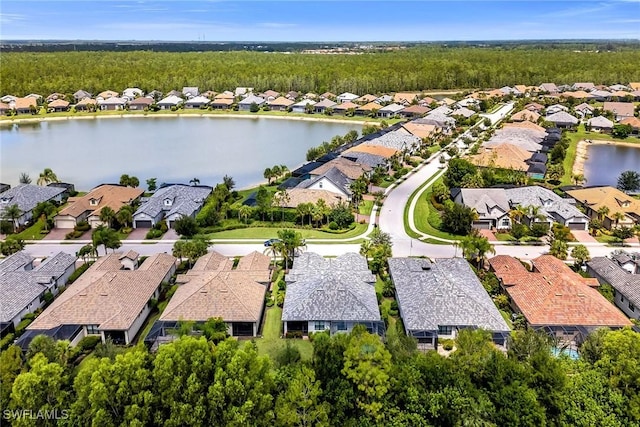 7690 Jacaranda Ln, Naples, FL 34114 - aerial perspective of suburban area featuring a nearby body of water