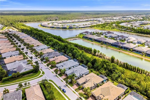 7690 Jacaranda Ln, Naples, FL 34114 - aerial view of residential area featuring a large body of water