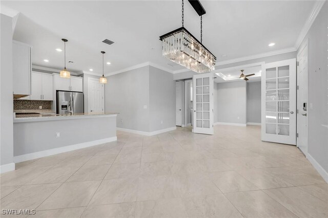 7690 Jacaranda Ln, Naples, FL 34114 - unfurnished living room with french doors, ornamental molding, recessed lighting, a ceiling fan, and light tile patterned floors